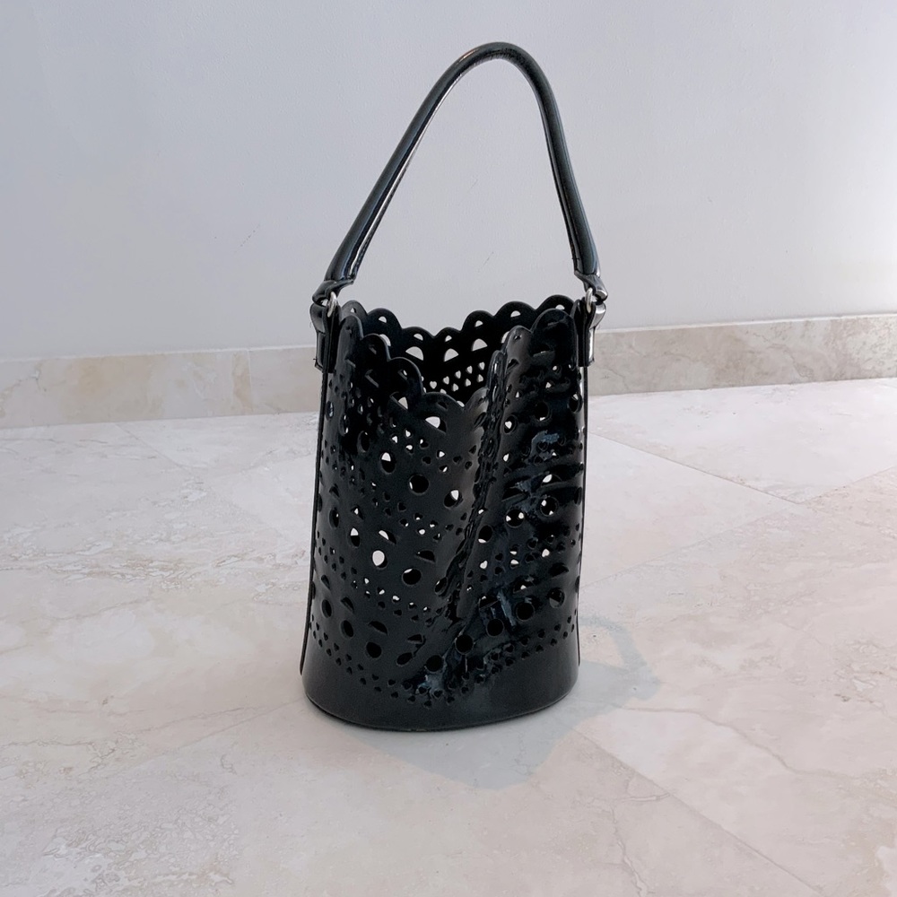 Cute, Vegan Laser Cut Black scalloped Neiman  Marcus bag